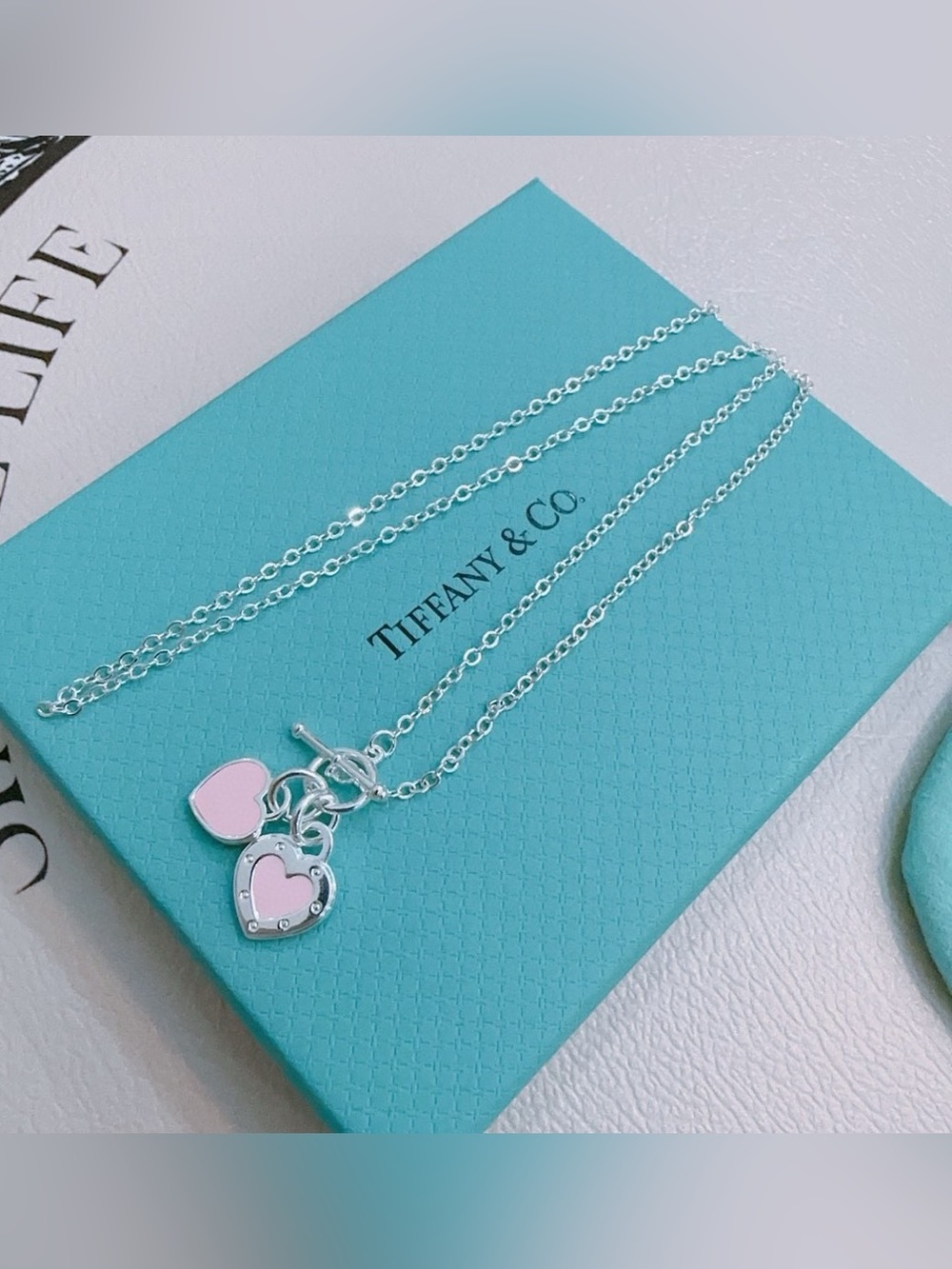 Tiffany & Co. Silver Necklace with Pink Heart Charms